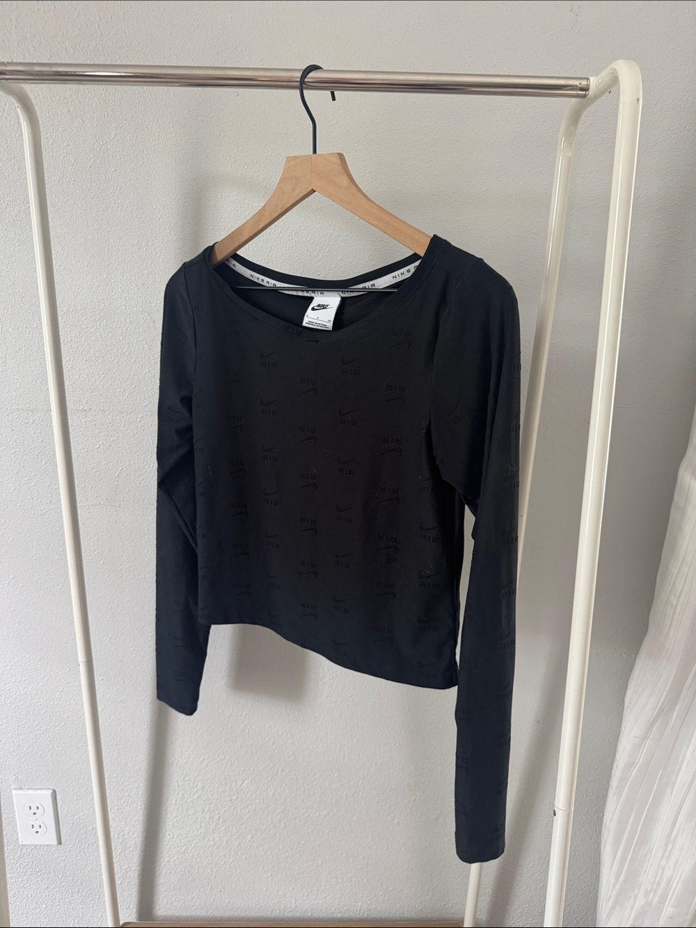Nike Women's Black Long Sleeve Scoop Neck Top with Subtle Logo Detail